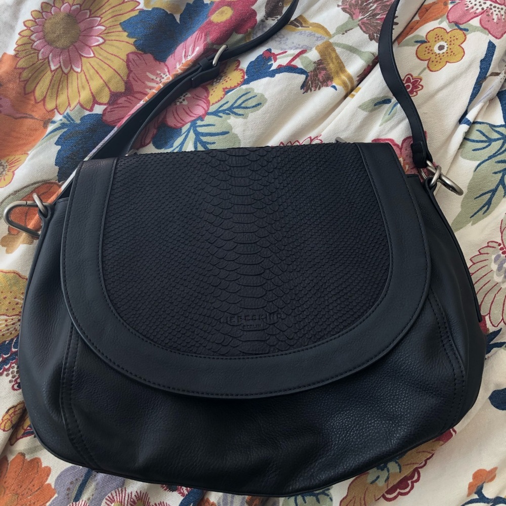 Black Liebeskind snake skin saddle bag.